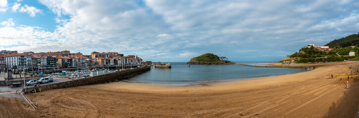Panoramic of the Island of San Nicolas at low tide from Isuntza beach in Lekeitioi, landscapes of...