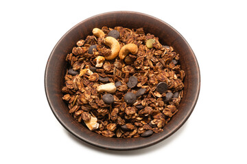 Chocolate granola cereal with nuts in a bowl background.