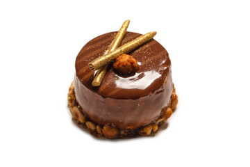 Chocolate and caramel cake isolated on a white background.