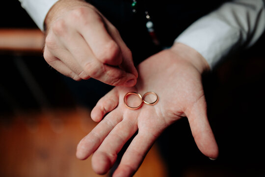 wedding rings on hands