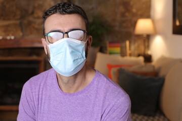 Man unable to see due to eyeglasses fogging up 