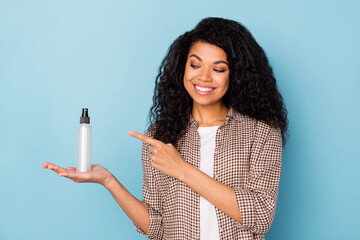 Photo of sweet shiny dark skin lady wear plaid shirt smiling pointing looking holding arm hand hair...