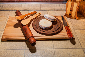 traditional sweet snacks from Argentina, known as alfajores, made of cornstarch, chocolate and nuts filled with dulce de leche, with grated coconut.