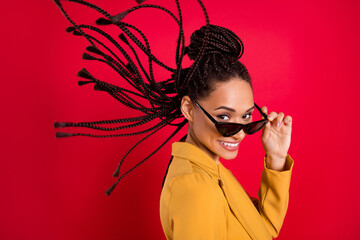 Profile photo of cool lady hand eyewear wear yellow blazer isolated on vivid red color background