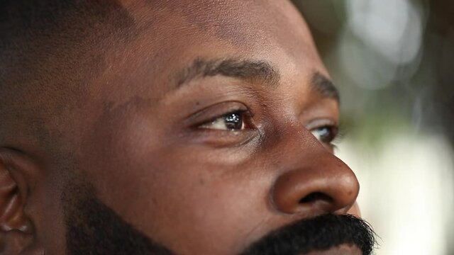 African man looking up at sky with GRATITUDE and FAITH