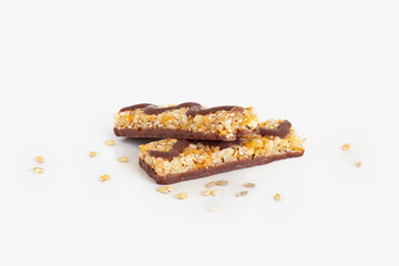 Cereal bars with chocolate on white background
