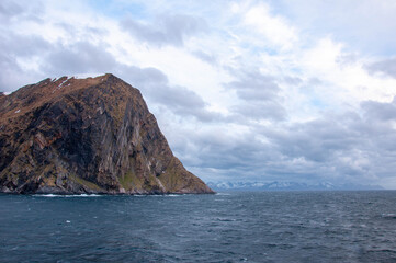 Fototapeta na wymiar Norwegian fjords shore landscapes view from the sea