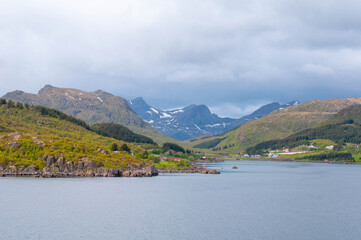 Norwegian fjords shore landscapes view from the sea