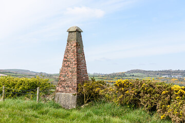 Large brick built navigation aid used to guide shipping, around 250 years old.