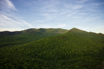 Early morning landscape view of Cascade Mt and Porter Mt from Owls Head in the Adirondack Park of...