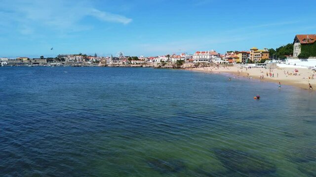 View from the Village of Cascais and a sandy beach with crystal clear water. Cascais Portugal