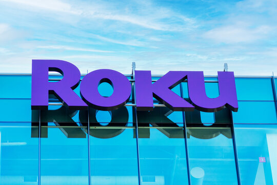 Roku sign and logo on the modern facade of consumer electronics and broadcast media company headquarters in Silicon Valley - San Jose, California, USA - 2021