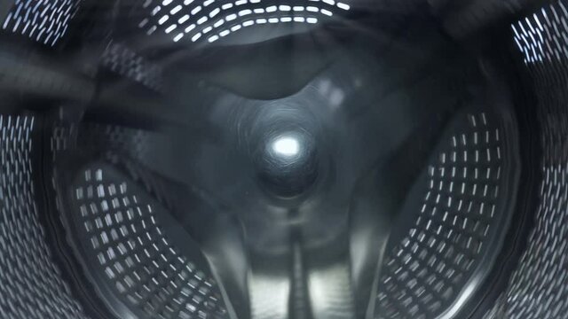 Inside of Empty Washing Machine Drum During Wash 