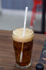 Drinks and ice inside the glass