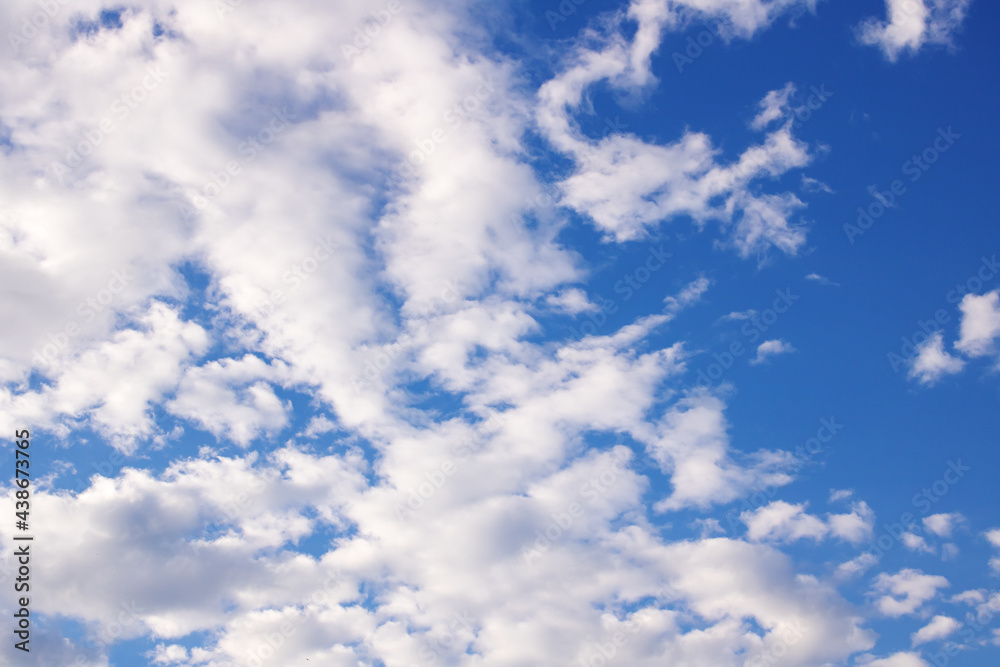 Wall mural white clouds in the bright blue sky