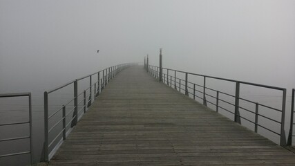 Fototapeta premium wooden bridge in the fog