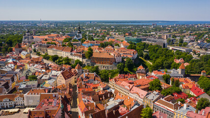 Fototapeta na wymiar Tallinn ,Estonia,Baltics. Beautiful panoramic aerial view photo from flying drone to Tallinn's medieval old town on a sunny summer day. (Series)