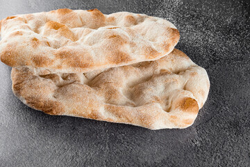 Dough for pinsa romana and scrocchiarella gourmet italian cuisine. Traditional dish in italy. Food delivery from pizzeria.