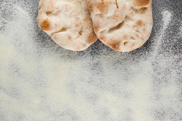 Dough and flour for pinsa romana and scrocchiarella gourmet italian cuisine. Traditional dish in italy. Food delivery from pizzeria.