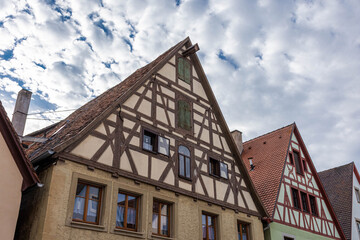 Fototapeta na wymiar Beautiful half-timbered houses in the historic center of Rothenburg ob der Tauber, Germany