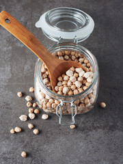 Dry chickpeas in a jar.