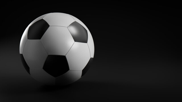 Black and White Football Isolated on Black Background.