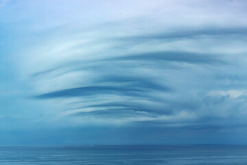 Unusual sky over the sea on a cloudy day.