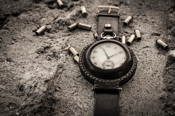 vintage military watches and bullet casings