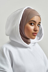 Portrait of attractive young arabian woman in hijab
