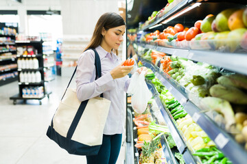 Customer using a ecologic bag at the market