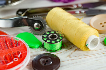 Threads, needles and sewing items.