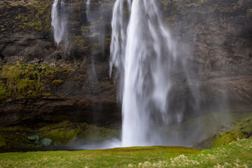 Fototapeta na wymiar Famous Seljalands water falls in Iceland during spring time