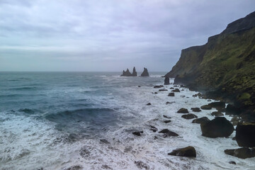 Lava rock formations at Reynisdrangar black sand beach in South Iceland