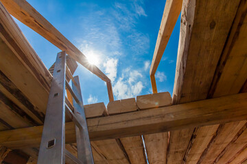new house construction from wood and wooden beams and rafters