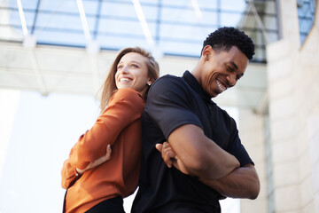 successful business couple standing in front of office center.