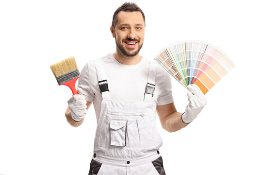 Painter in a white uniform holding a color palette and a brush