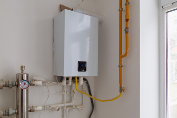 Modern gas boiler. Heating and hot water system in the house. Background