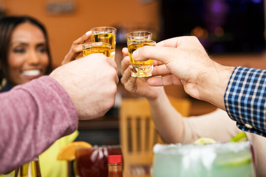 Cinco: Friends Doing Toast With Shot Of Tequila