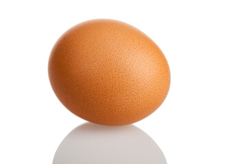 large chicken egg, selected, isolated on a white background, close-up