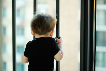 Baby girl on balcony