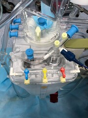 Venous reservoir and oxygenator connected with heart lung machine by tubing circuit for...