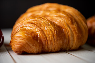 Croissant bakery on white wooden table
