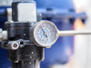 Pressure gauge of measuring instrument close up in industry zone at power plant with closed up