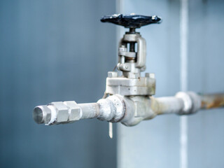 Obraz premium Manual valve for apply industrial zone which popular to install with tank, pipe, pump, and pond in Combined-Cycle Co-Generation Power Plant.