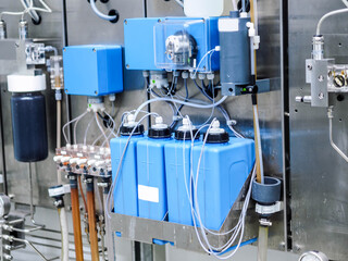 Closed up part of analyzer at sampling room in power plant.