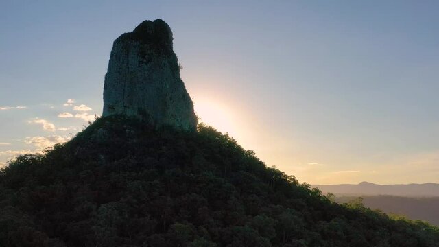 Aerial view of Mt Coonowrin (fg) & Mt Beerwah, Glasshouse Mountains, Sunshine Coast, Queensland, Australia.