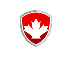 Obraz premium Simple shield with maple leaf inside