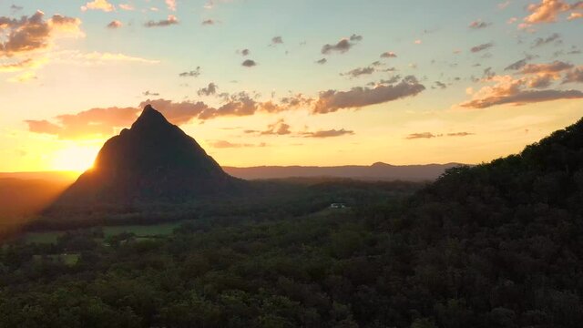Aerial view of Mt Coonowrin (fg) & Mt Beerwah, Glasshouse Mountains, Sunshine Coast, Queensland, Australia.