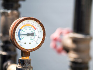 Pressure gauge of measuring instrument close up in industry zone at power plant