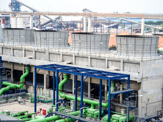 Fototapeta premium Cooling tower systems for supply cooling water to mature equipment in power plant about industrial concept.